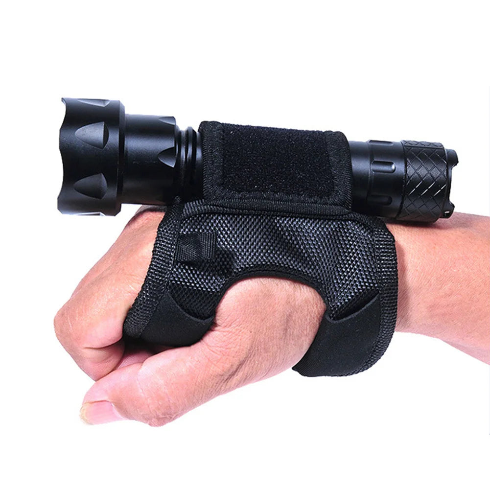 Black neoprene scuba diving flashlight sleeve with adjustable wrist strap and thumb groove for secure LED torch mount