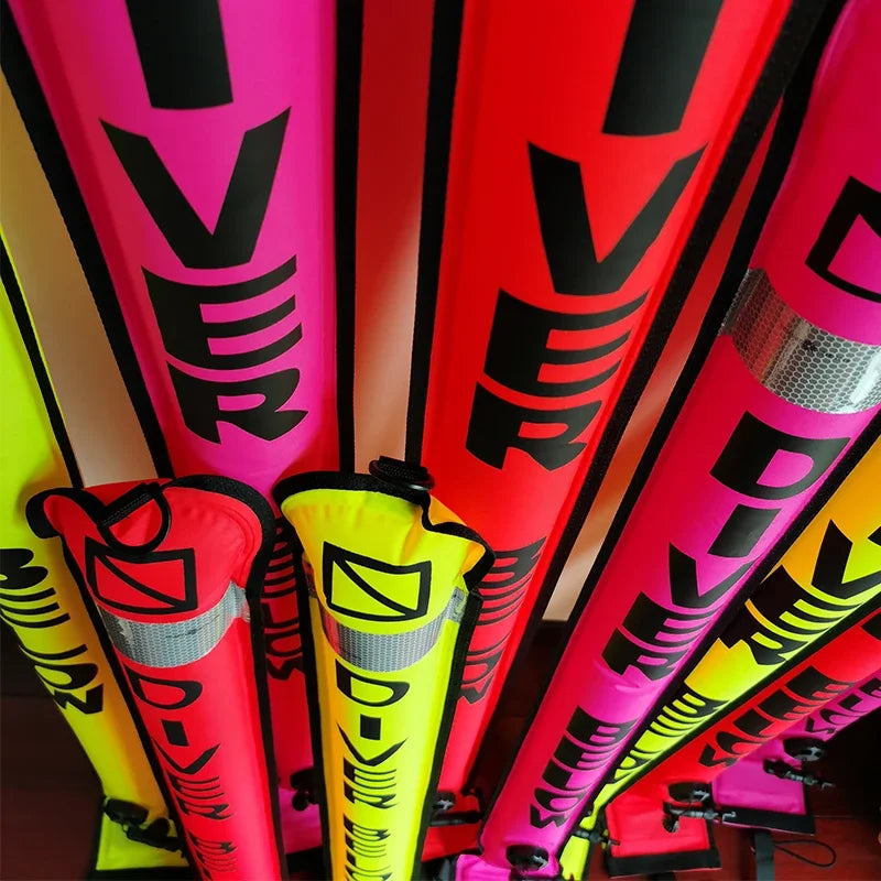 Colorful inflatable Diving SMB buoy in orange and fluorescent colors for scuba diving safety and visibility, available in 1.2m, 1.5m, and 1.8m sizes.